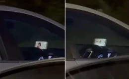 Sürücü kadın, otobanda film izleyerek araç kullanırken görüntülendi