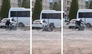 İki genç kız otoparkta yumruk yumruğa kavga etti
