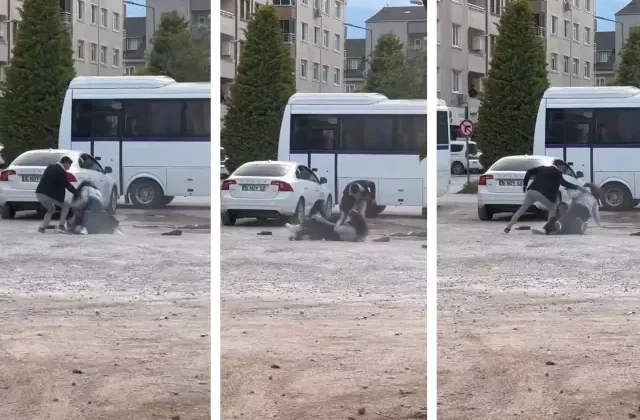 İki genç kız otoparkta yumruk yumruğa kavga etti