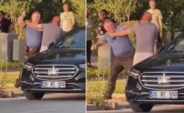 Polis ile iş insanı trafikte yumruk yumruğa kavga etti