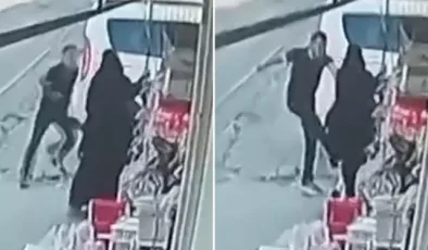 Sokak ortasında eşine tekme ve yumrukla saldırdı