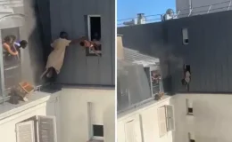 Kahraman kapıcı, yanan binanın 6. katından dört bebeği canını hiçe sayarak kurtardı