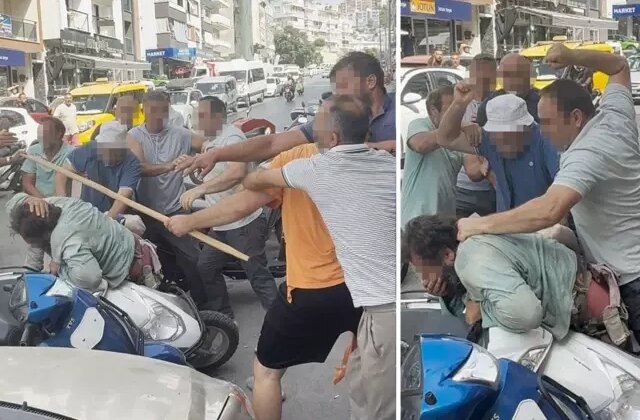 Yol ortasında yumruk ve sopalarla öldüresiye dövdüler