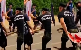 Rum Kesimi’nde çirkin provokasyon! KKTC bayrağını yakma girişimini Rum polisi engelledi