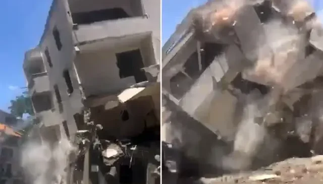 Yıkımı yapılan bina, kepçenin müdahalesiyle yola çöktü