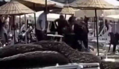 Halk plajında şezlong kavgası: Zabıta ile para toplayanlar arasında arbede
