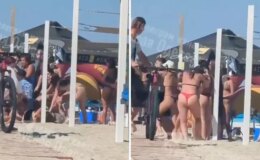 Kadınlar yasaklı Rusça şarkı yüzünden plajda saç başa kavga etti
