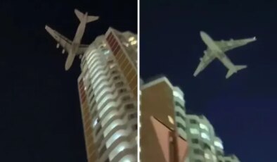 Dünyanın en büyük kargo uçağı droneden kaçarken az daha binalara çarpıyordu