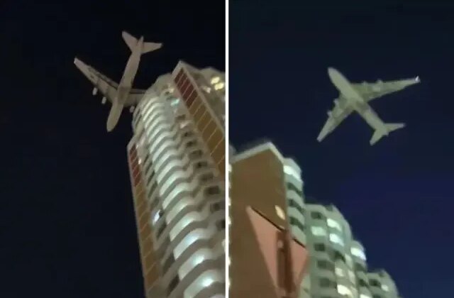 Dünyanın en büyük kargo uçağı droneden kaçarken az daha binalara çarpıyordu