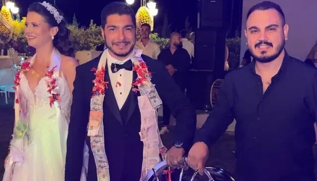 Gelin ve damada taktığı takı herkesi şaşkına çevirdi