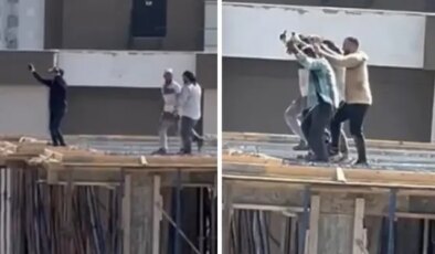 Otomobilden müzik sesi duyan işçiler 10. katta halay çekti