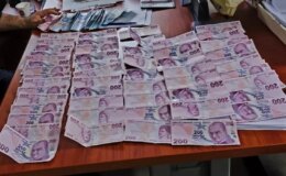 Ekipler dilencinin üzerinden çıkan parayı saya saya bitiremedi