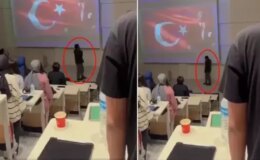 Saat 9’u 5 geçe herkes saygı duruşunda bulunurken, o telefon elinde volta attı