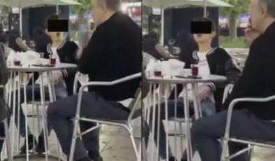 Vahim görüntüler! Küçücük çocuk ailesinin yanında sigara içti, bir de halka çıkardı