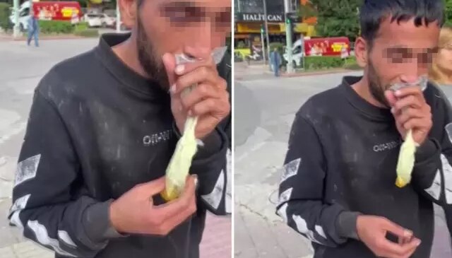 Caddede güpegündüz bali çekip kendinden geçti