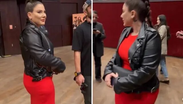 Ferit Kaya hayranlarıyla fotoğraf çektirirken eşinin bakışları dikkat çekti