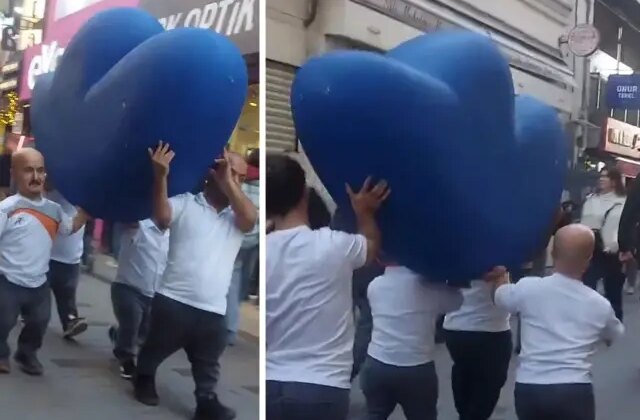 Vatandaşlar şaşkınlıkla izledi! Bir grup cüce cadde boyunca “F” harfi taşıdı