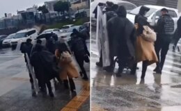 Fırtınada yürüyemeyen bebekli annenin imdadına Çevik Kuvvet yetişti