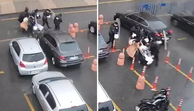 Polisler, anne ve bebeğini fırtınadan kalkanla korudu