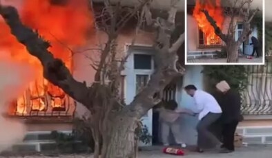 Kedisini kurtarmak için alevlerin içine daldı, komşuları güçlükle dışarı çıkardı