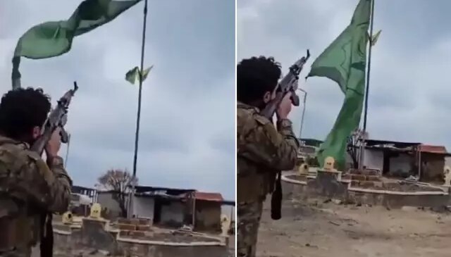 Komşuda tarihi an! Terör örgütünün sözde bayrağını silahla vurarak düşürdü