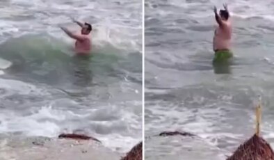 Silivri’de bir vatandaş soğuk hava ve lodosa aldırış etmeden denize girdi