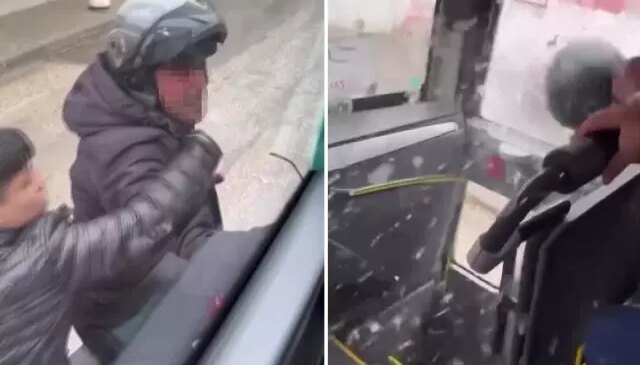 Trafikte tartıştığı servis aracının camını kaskıyla kırdı