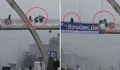 Üst geçitte kar topu atan çocukları yumruklayıp, yerde tekmeledi