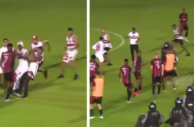 Taraftarlar sahaya girip futbolcularla yumruk yumruğa kavga etti