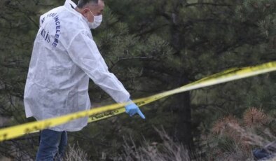 Annenin cesedi toprağa gömülü, oğlu da silahla vurulmuş halde bulundu