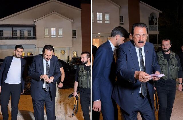 Ertoşi aşiretinin lideri İskender Ertuş aracından iner inmez deste deste para dağıttı