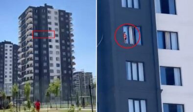12’nci katta yürekleri ağza getiren anlar! Çocuk pencereye çıktı