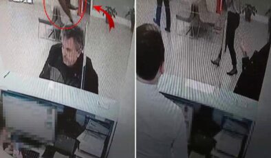 Bankada işlem yaparken başına kedi düştü: Kalpten gidiyorduk