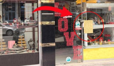 Cam silmekten yorulan esnafın eşi çareyi vitrine not asmakta buldu