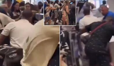 Sıcaktan bunalan halk vantilatör kapmak için mağazada birbirini ezdi