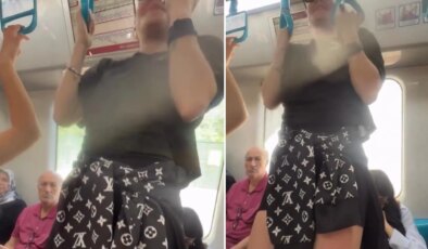 Marmaray’da pes dedirten görüntü! Yolculara aldırış etmeden barfiks çekti