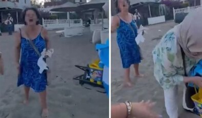 Seferihisar’da türbanlı anne ve kıza plajı dar eden kadın tutuklandı