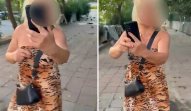 Kedileri besleyen kadın, insanların sokaktan geçmesine izin vermedi