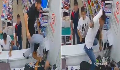 Kırtasiyeyi bastılar, sahibine tekme tokat saldırdılar